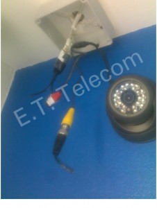 A CCTV camera with damaged cabling